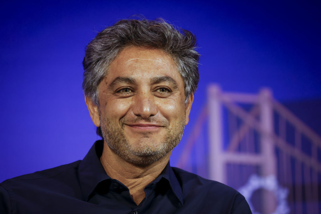 Musk’s longtime backer gives SpaceX stock to investors